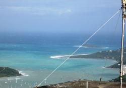 Runoff after Tropical Storm Isaac is turning Coral Bay brown, as seen from Ajax Peak, St. John. Runoff after Tropical Storm Isaac is turning Coral Bay brown, as seen from Ajax Peak, St. John.
